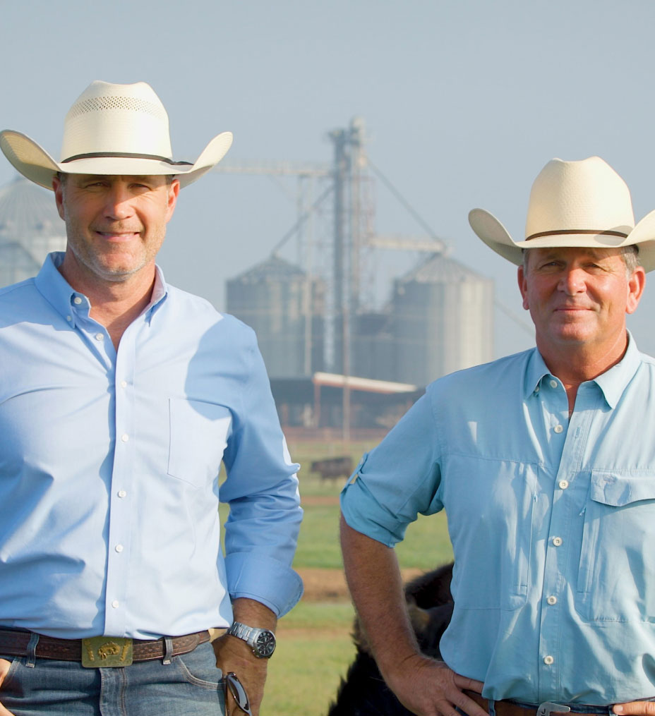 Two men in cowboy hats.